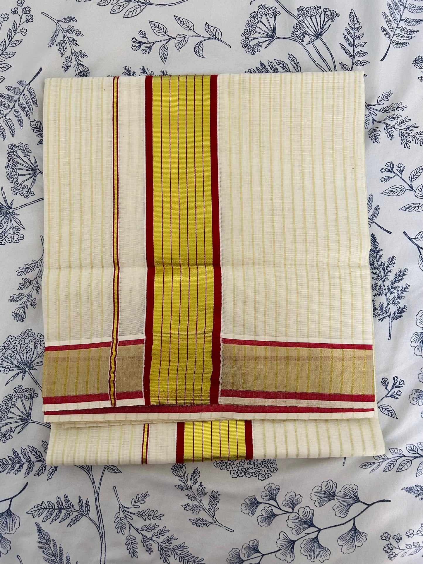 Kerala cotton saree with vertical golden stripes & maroon border