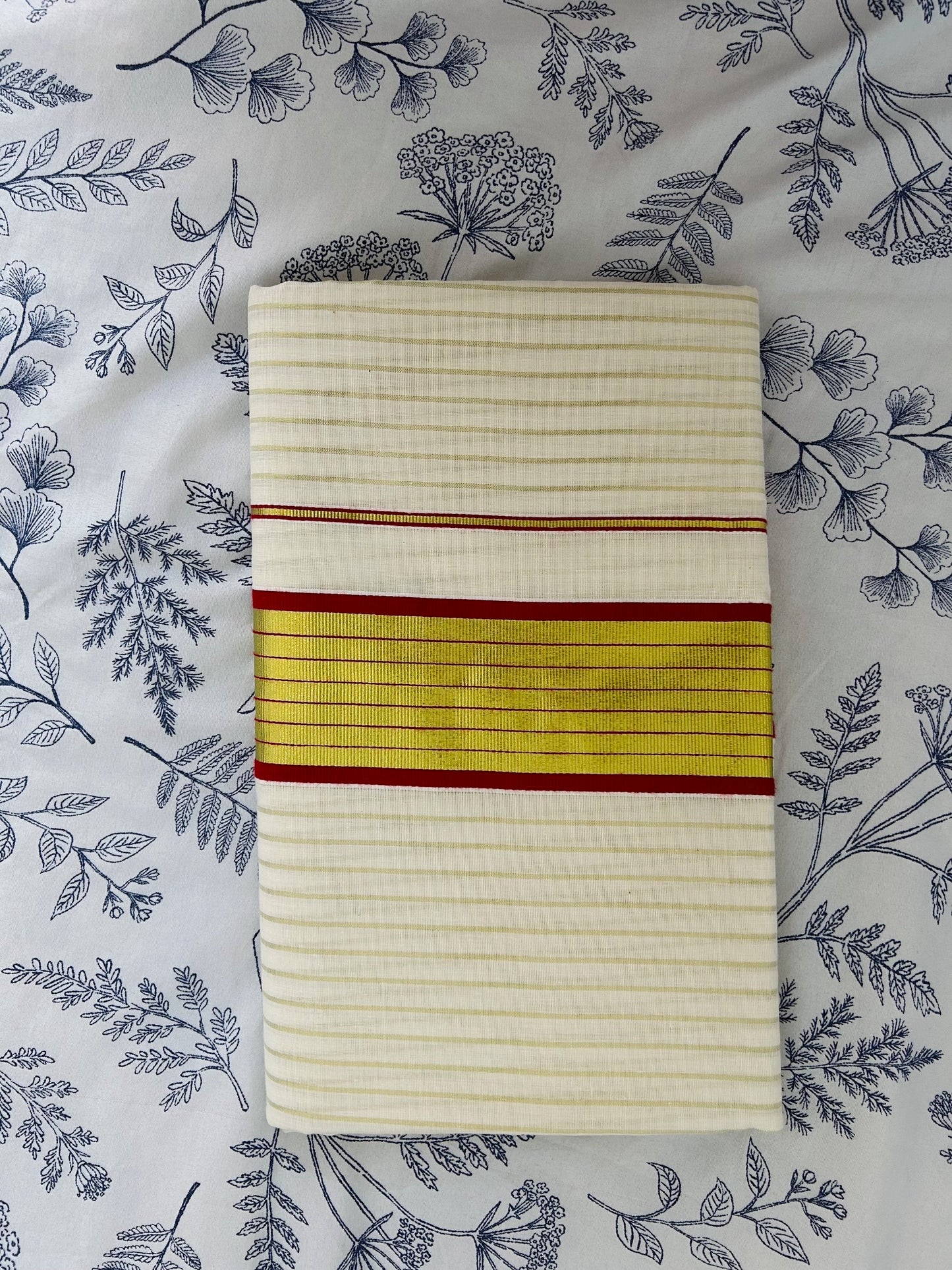Kerala cotton saree with vertical golden stripes & maroon border